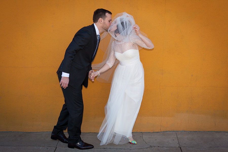 bride and groom kissing