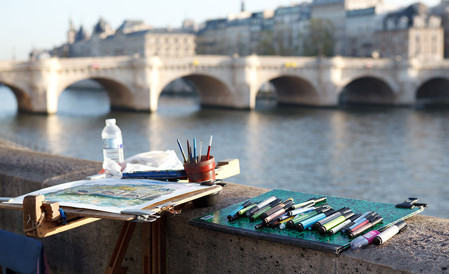 Artist ready to paint Seine River, Paris France