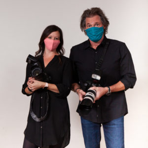 Photographers with COVID masks on