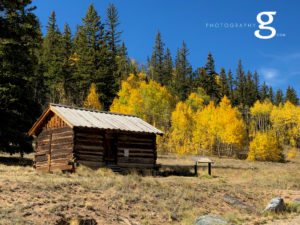 old mining cabin in beautiful mountain valley